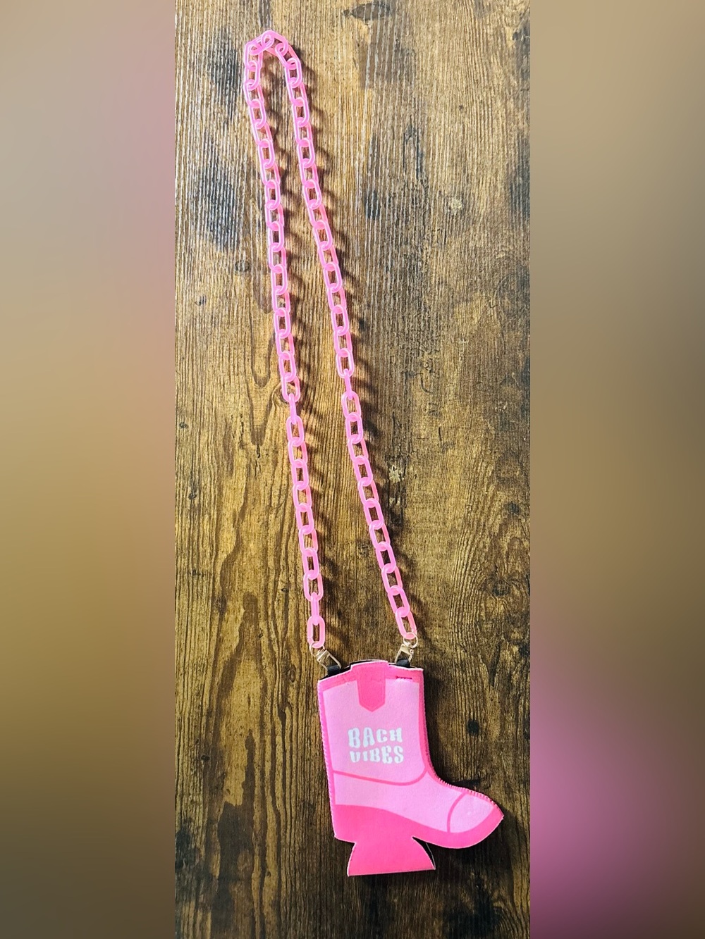 Pink Boot-Shaped Slim Can Koozie Purse with pink chain and gold hardware